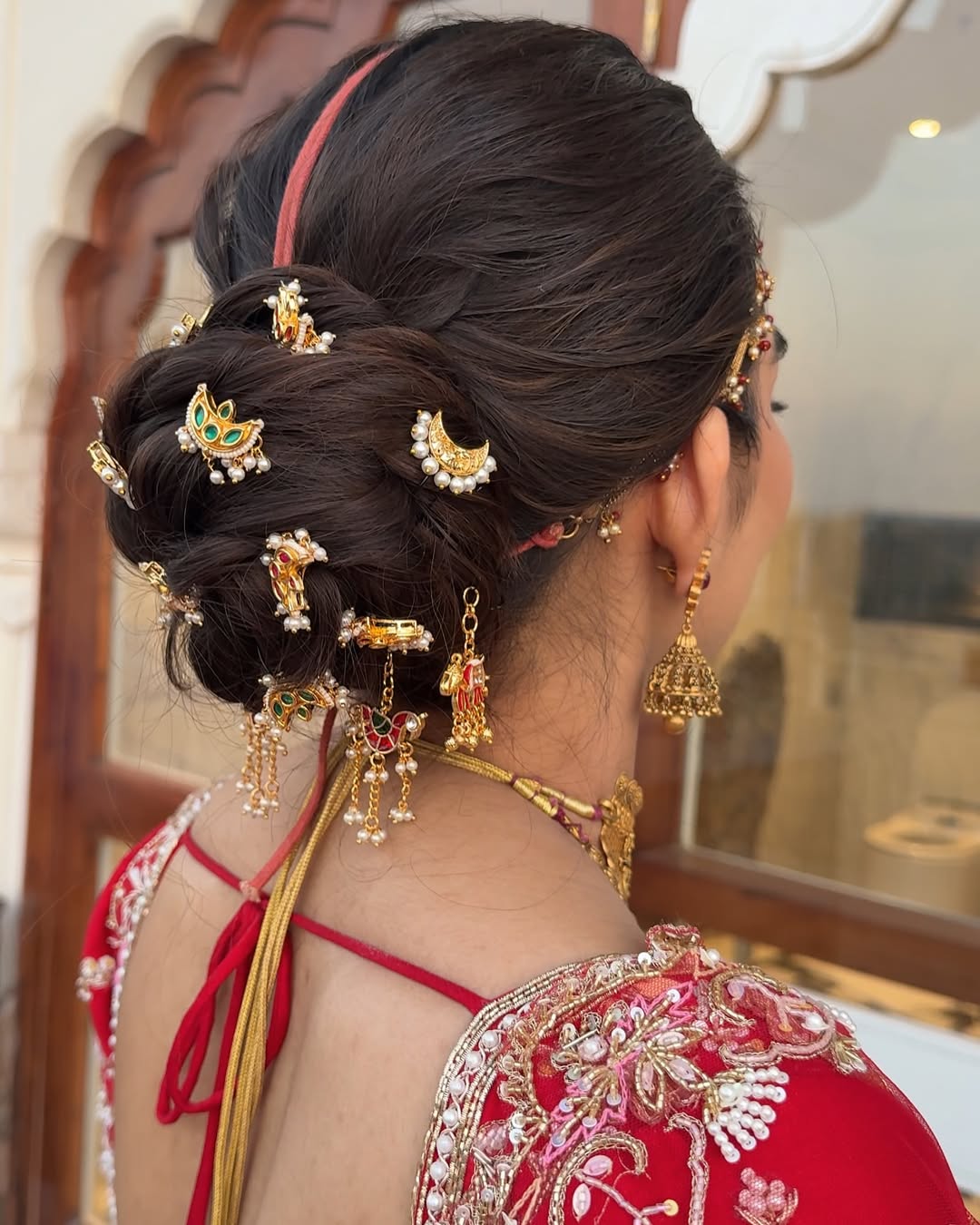 Regal Messy Bun with Traditional Hair Pins