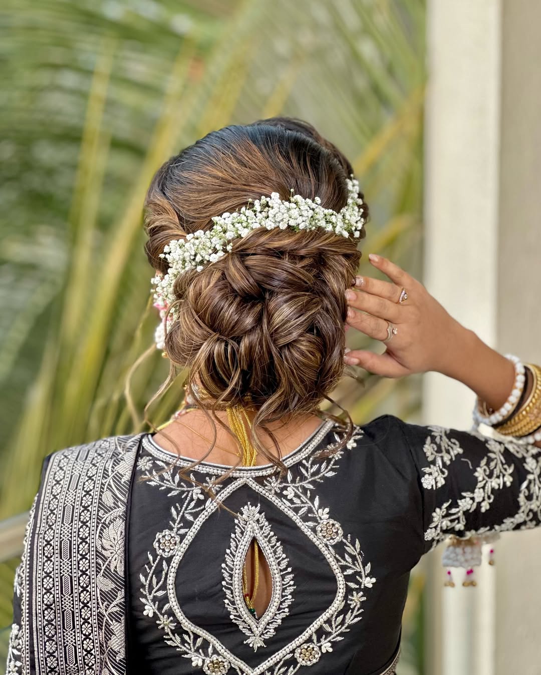 Side Hair Twists and a Messy Bun